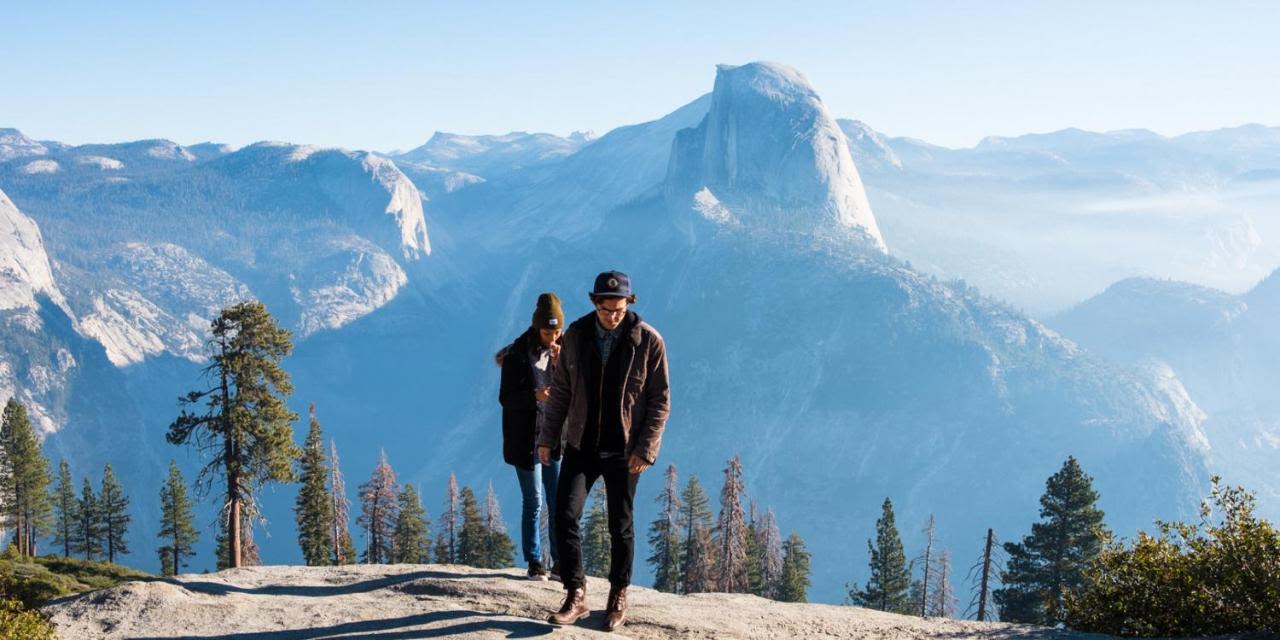 Couple walking in Yosemite Park